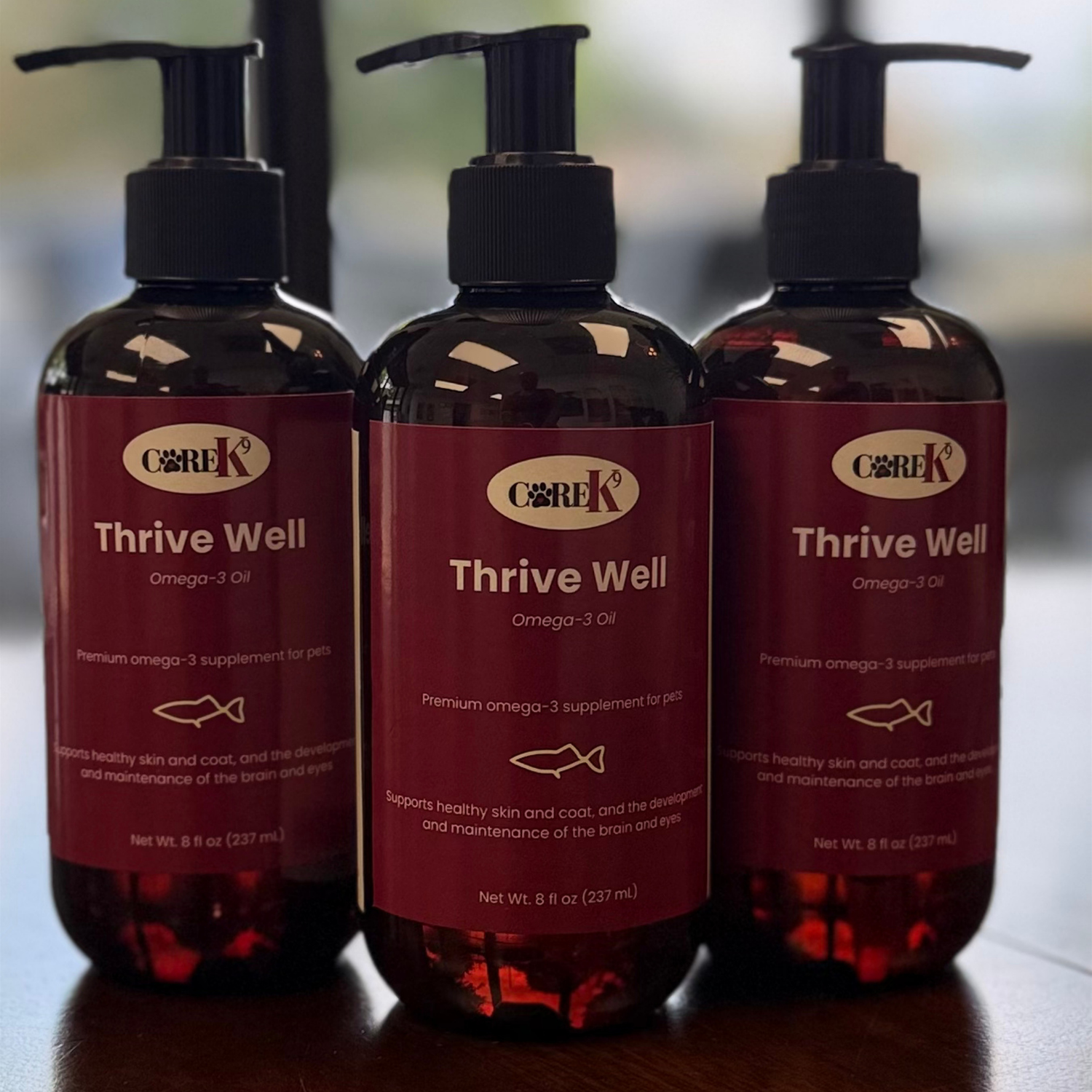 CORE K9 Thrive Well omega-3 fish oil bottle for dogs, 8 oz amber pump bottle